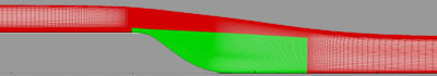 Maillage d'une conduite coudée et résultat d'un calcul avec couplage des méthodes statistique (zone rouge) et directe (zone verte) 